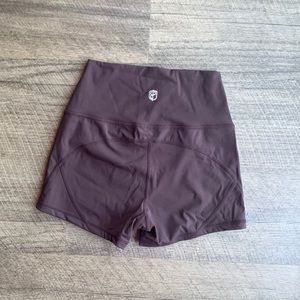 Born primitive your go to booty shorts plum